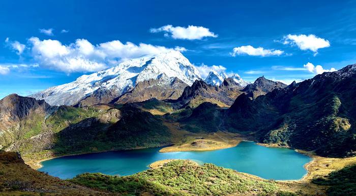 Glacial lake and snow peak in the mountains of West China