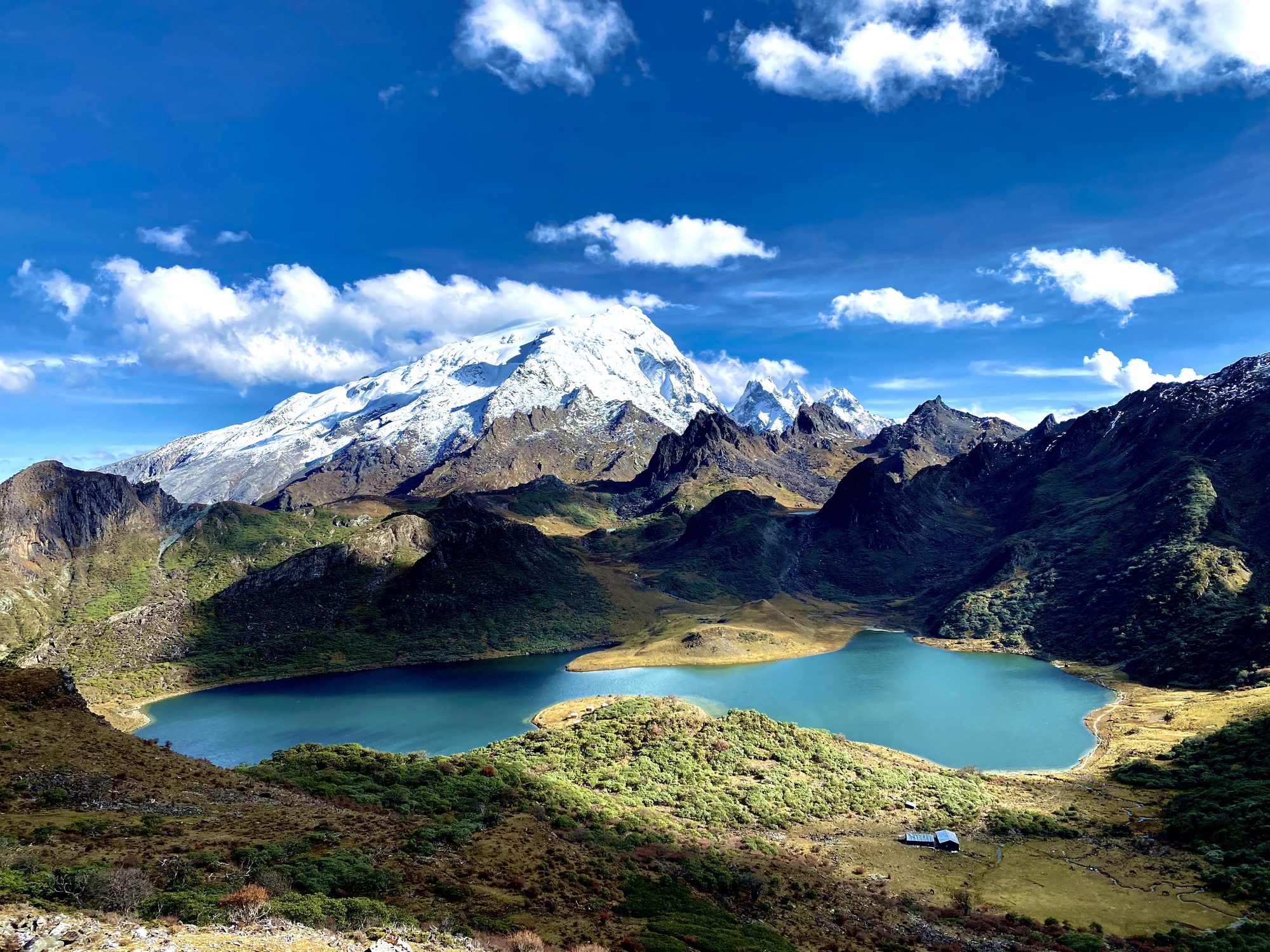 High-altitude lake and glaciated peak in the mountains of West China